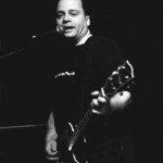 What am I bid for this guitar? Photo By Andy Thorpe
